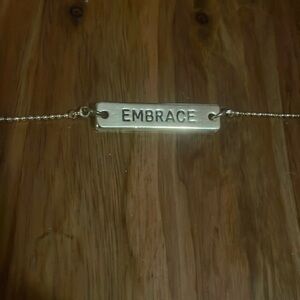 NWOT EMBRACE LET GO bracelet, excellent condition